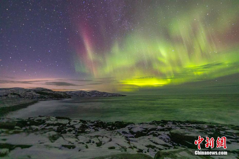 Китайский фотограф снял полярное сияние в русском селе